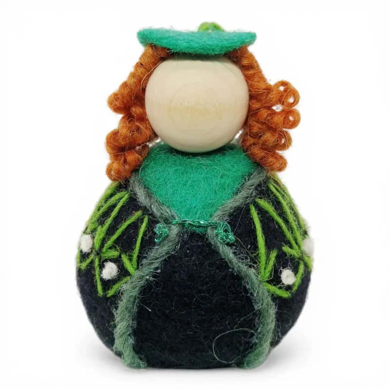 Handmade wool Girl Flóki with curly hair, elegant emerald green sweater with knot decor. Icelandic souvenir and gift