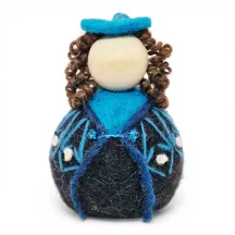 Handmade wool Girl Flóki with curly hair, elegant turquoise sweater with knot decor. Icelandic souvenir and gift