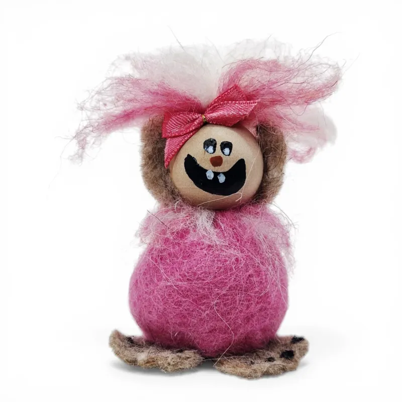 Handmade light pink wool Troll Girl Flóki, a wild-looking and mischievous baby troll. Icelandic souvenir and gift.