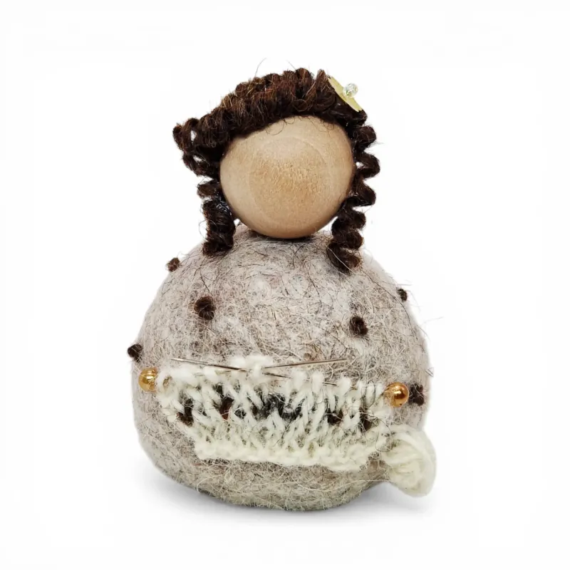 Handmade camel wool Knitting Lady Flóki knitting a sweater. Icelandic souvenir and gift