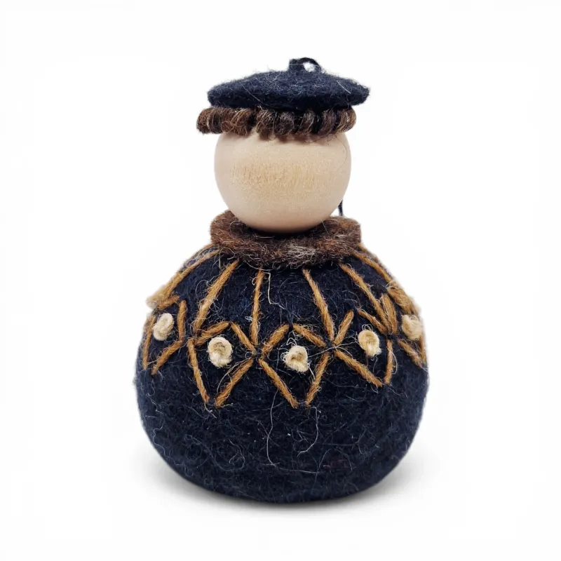 Handmade Shepherd Flóki in a patterned brown Icelandic wool sweater and a hat. Icelandic souvenir and gift