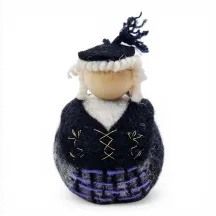Handmade wool Icelandic Lady Flóki in traditional old Upphlutur and purple Niðurhlutur outfit. Icelandic souvenir & gift