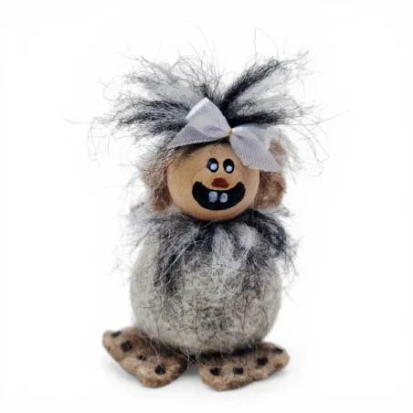 Handmade gray wool Troll Girl Flóki, a wild-looking and mischievous baby troll. Icelandic souvenir and gift.