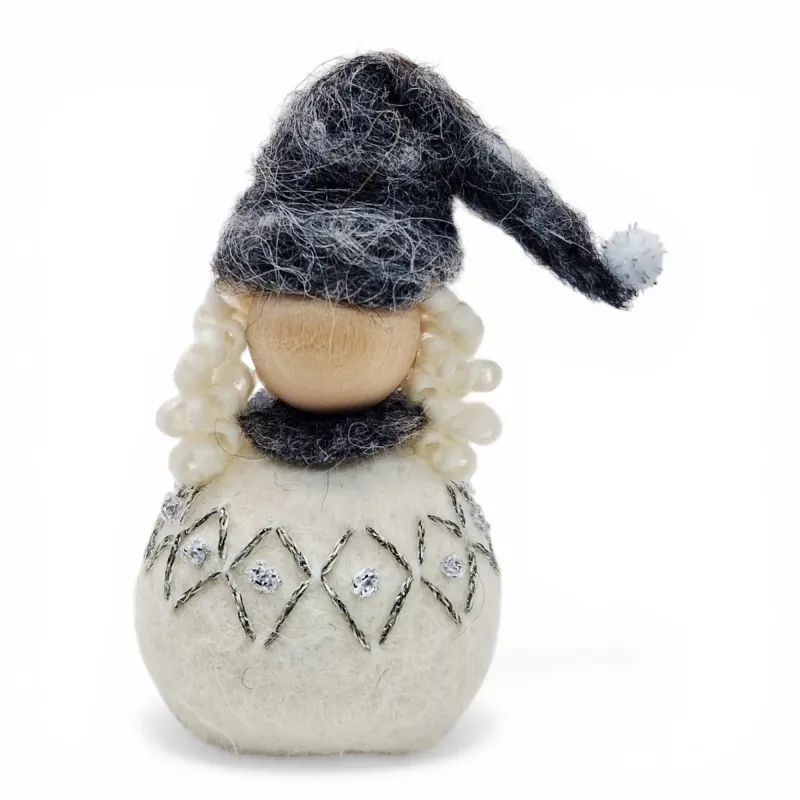 Handmade wool Santa Girl Flóki with a grey tasselled hat and matching diamond wool sweater.Icelandic folk art and gift