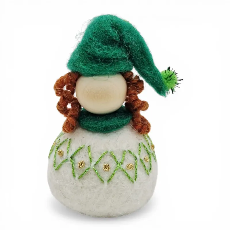 Handmade wool Santa Girl Flóki with a green tasselled hat and matching diamond wool sweater. Icelandic souvenir and gift