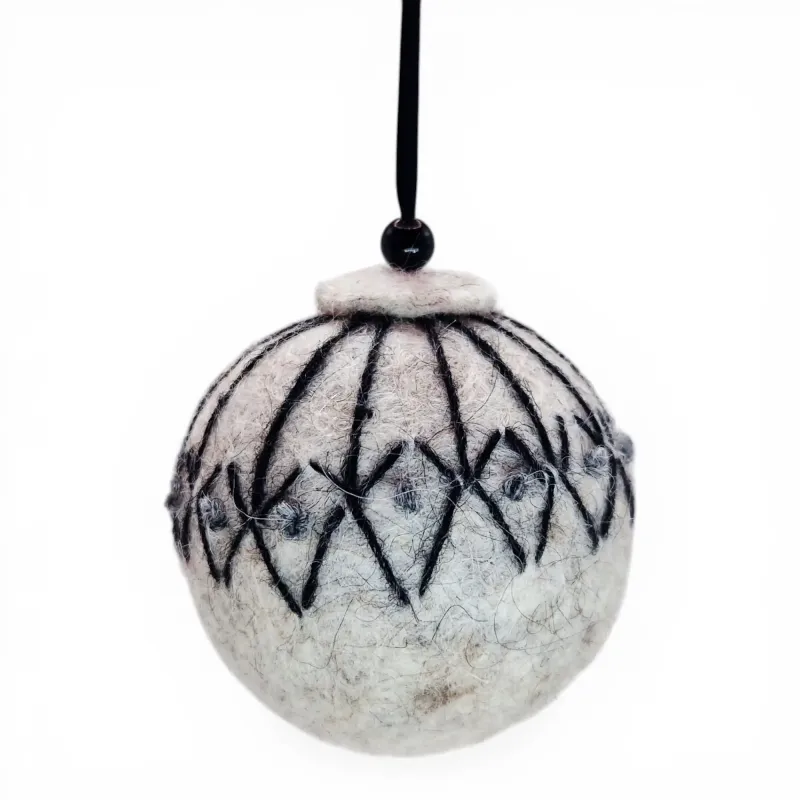 Handmade gray wool Christmas ornament,  rustic charm stitched with black Lopi Einband yarn. Iceland souvenir & gift
