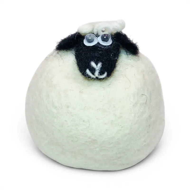 Beautiful handmade wool Lamb Flóki in white, with a black head, and cute lamb eyes. Icelandic souvenir and gift