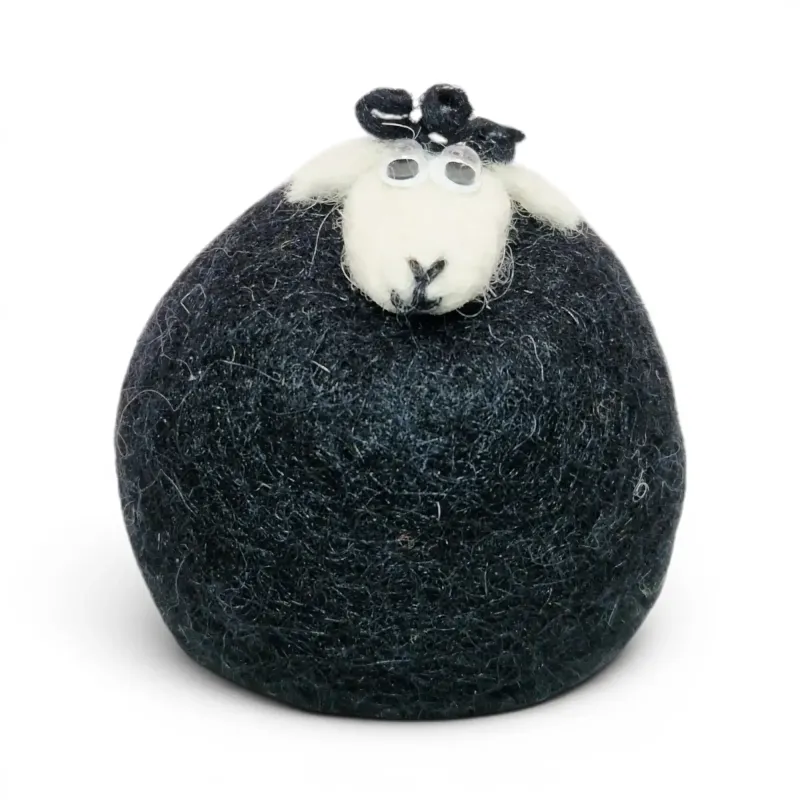 Beautiful handmade wool Lamb Flóki in black, with a white head, and cute lamb eyes. Icelandic souvenir and gift